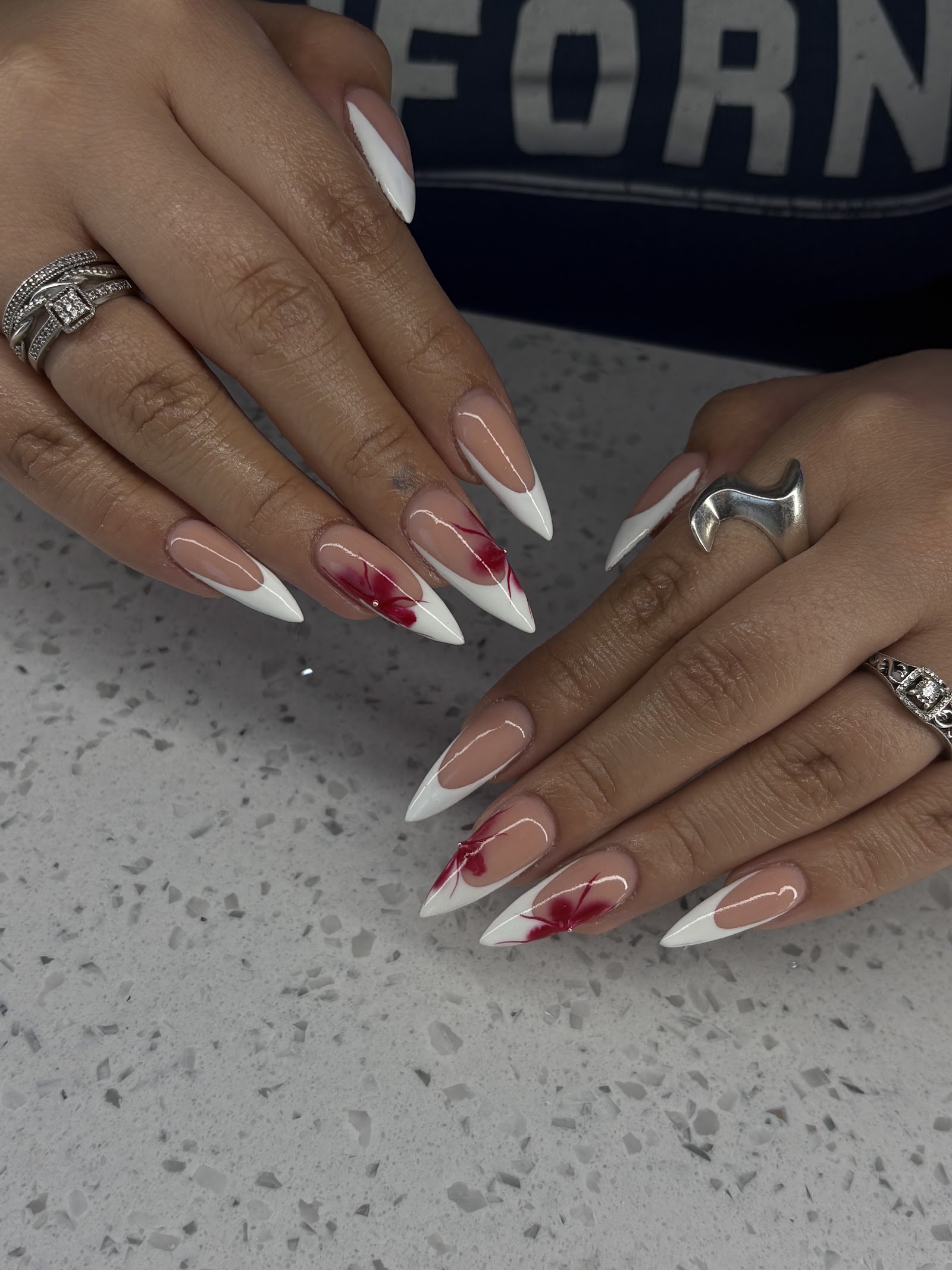 Enchanted Beauty & Nails logo